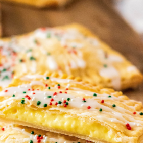 Image of holiday pies cut in half with sprinkles on top.