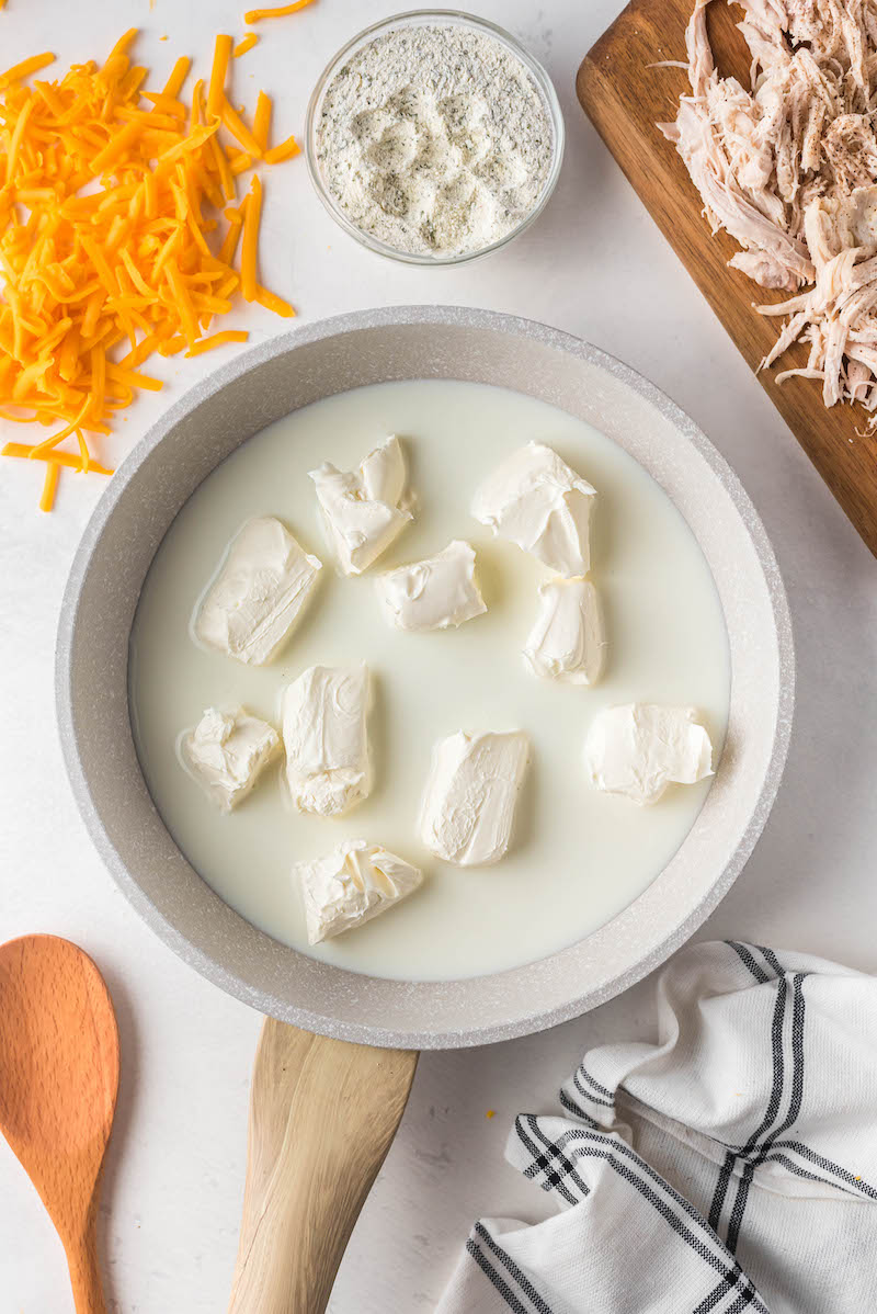 Cream cheese melting in a sauce pan.