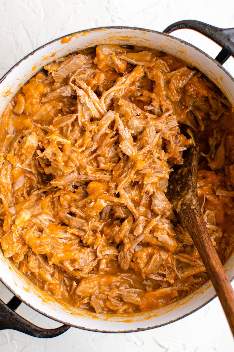 Red sauce mixed into shredded pork.