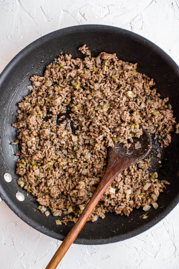 Cooked ground beef in a pan.