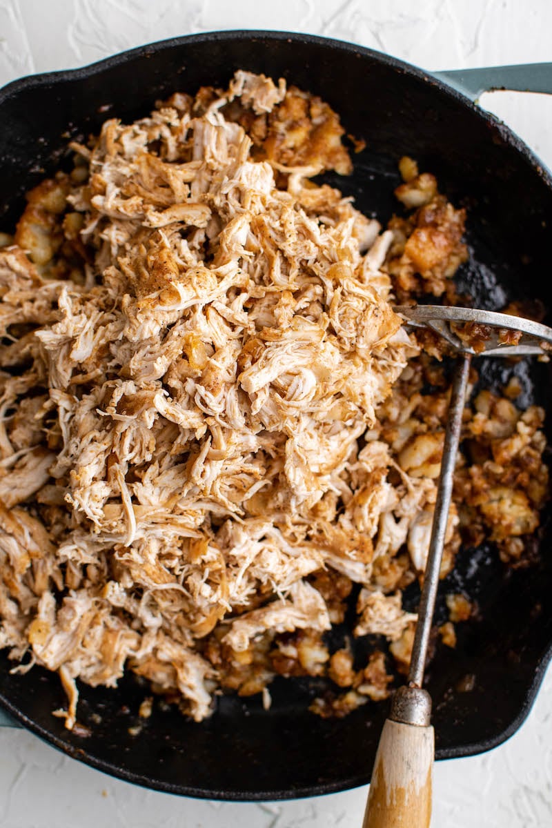Shredded chicken with mashed potatoes.