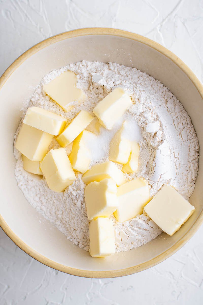 Butter sliced up into flour.