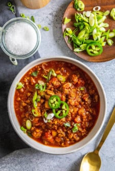 Bowl of keto chili with garnishes.