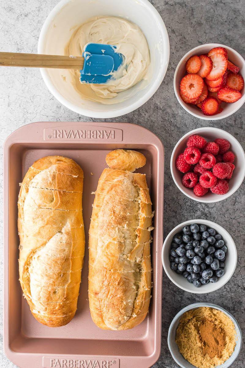 Sliced french bread in a pan.