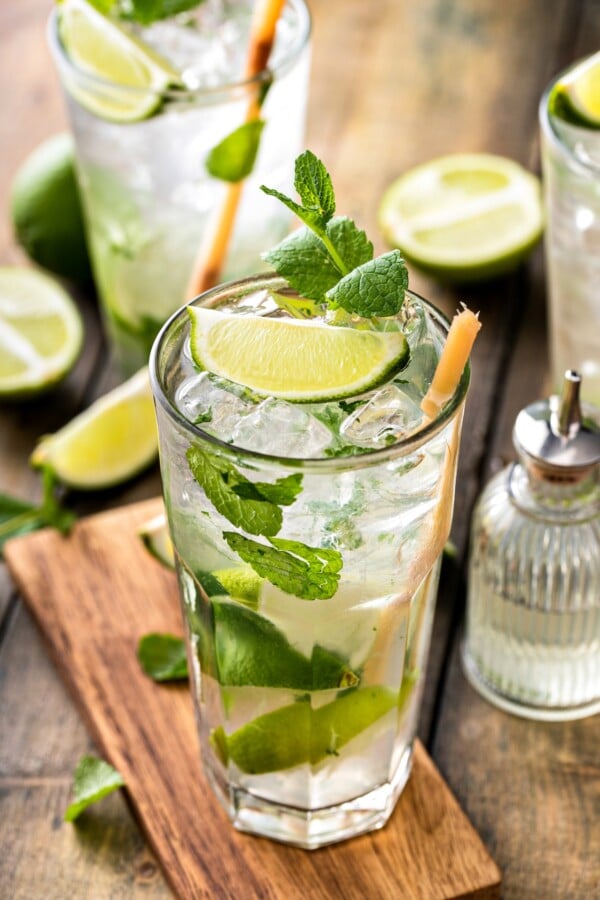 Mojito with a lime wedge on top.