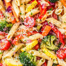 Penne pasta with parmesan and vegetables.