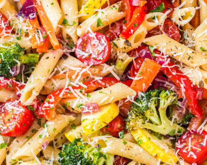 Penne pasta with parmesan and vegetables.
