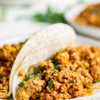 Chorizo and eggs in tortillas.