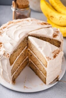 Angled view of a banana cake with two slices sliced