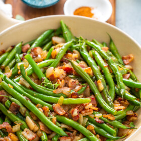 Sautéed green beans with thick cut bacon.