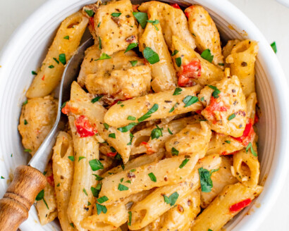 Creamy pasta and chicken in a bowl.