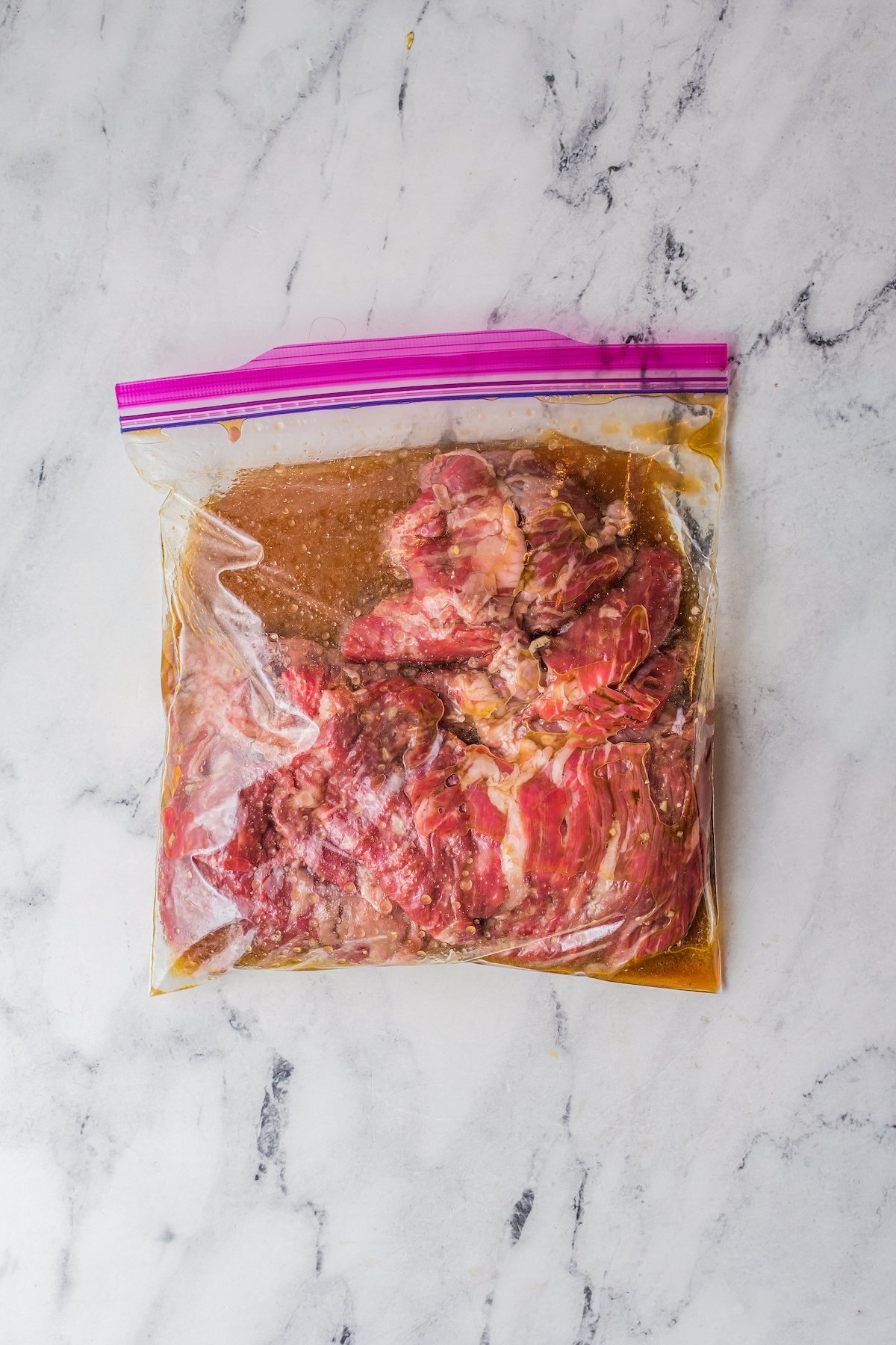 Flank steak in a bag with marinade.