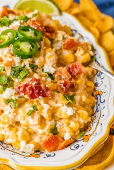 Jalapeños and bacon on top of corn dip.