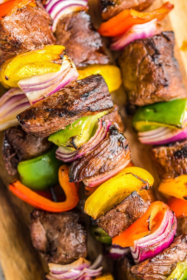 Steak kabobs with bell peppers and onion.