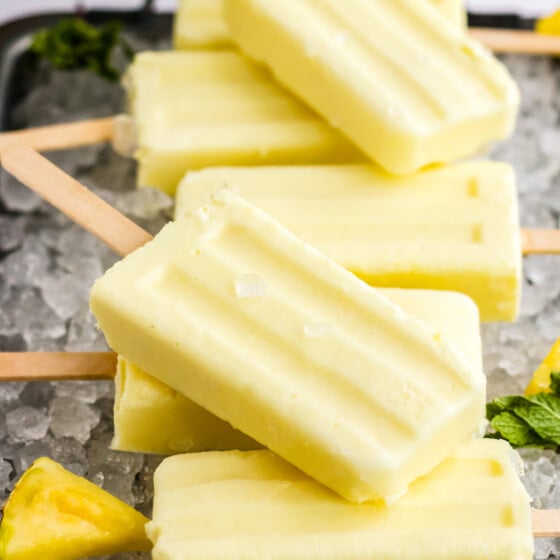 stack of dole whip popsicles on a metal tray