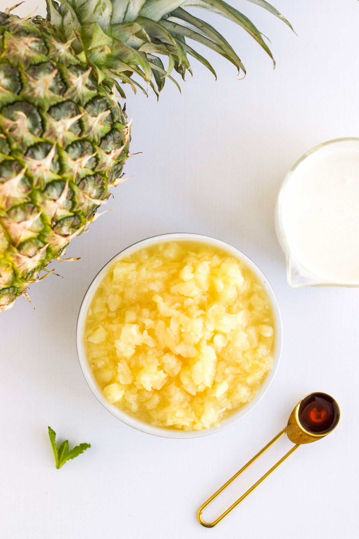 ingredients for dole whip popsicle with canned pineapple and vanilla