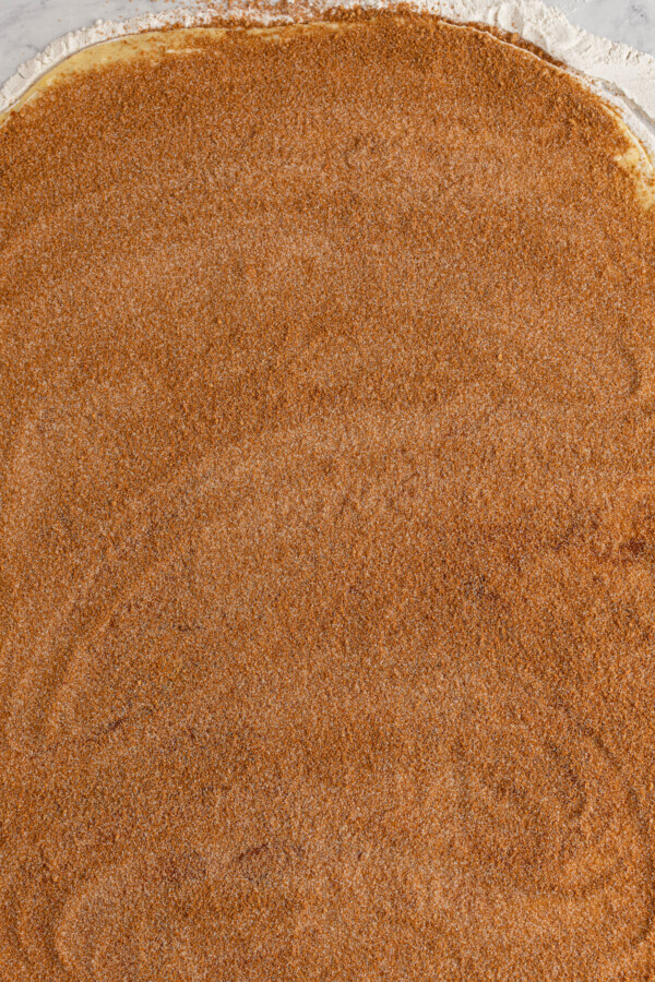 Cinnamon and brown sugar smoothed over rolled out dough.