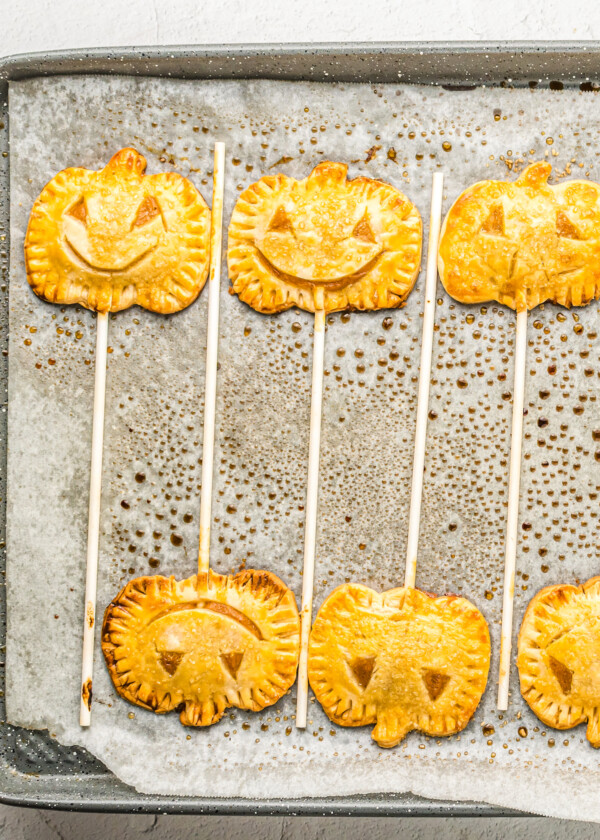 Baked pie pops on a tray.