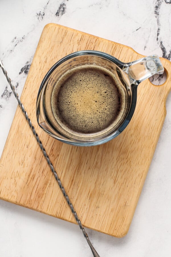 fresh spirituous espresso in a measuring cup