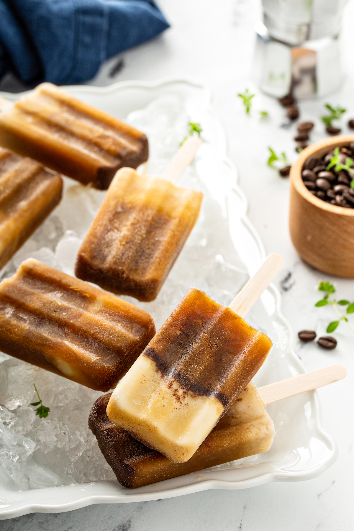 popsicles on ice on a tray