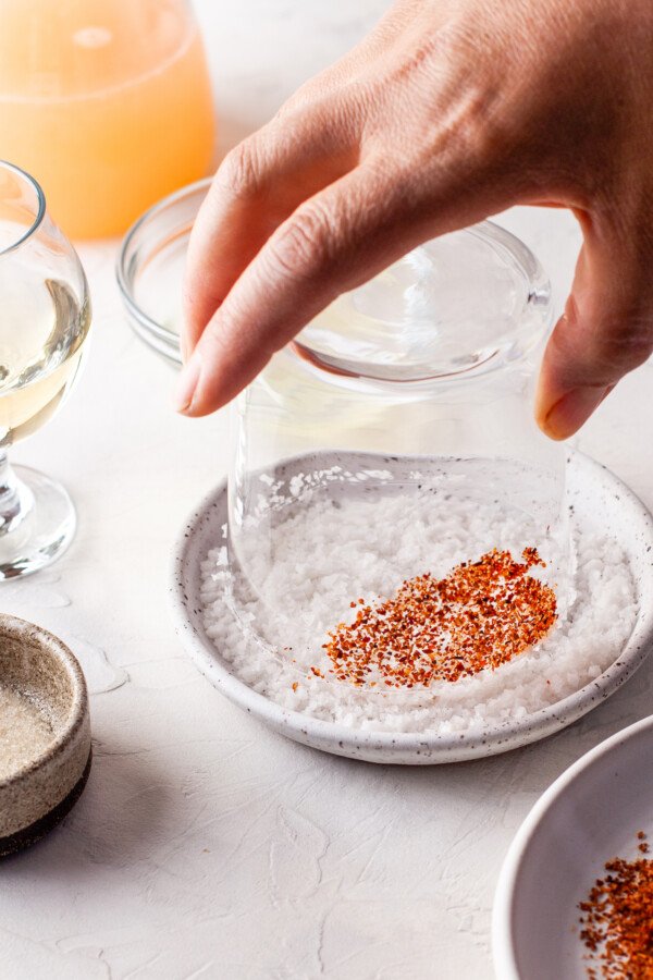 The rim of a glass coated in coarse salt.