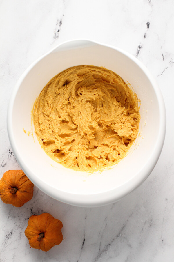 Canned pumpkin mixed into cookie dough.