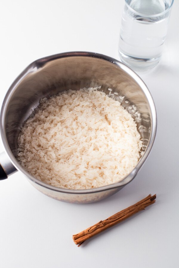 Rinsed rice in a saucepan.
