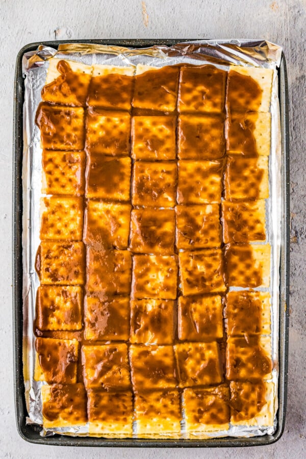 A tray of saltines spread with homemade toffee.