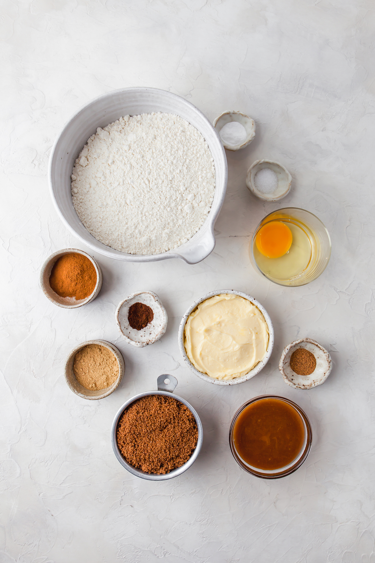 Clockwise from top: Flour, salt, baking powder, egg, nutmeg, softened butter, molasses, brown sugar, ginger, cloves, cinnamon.