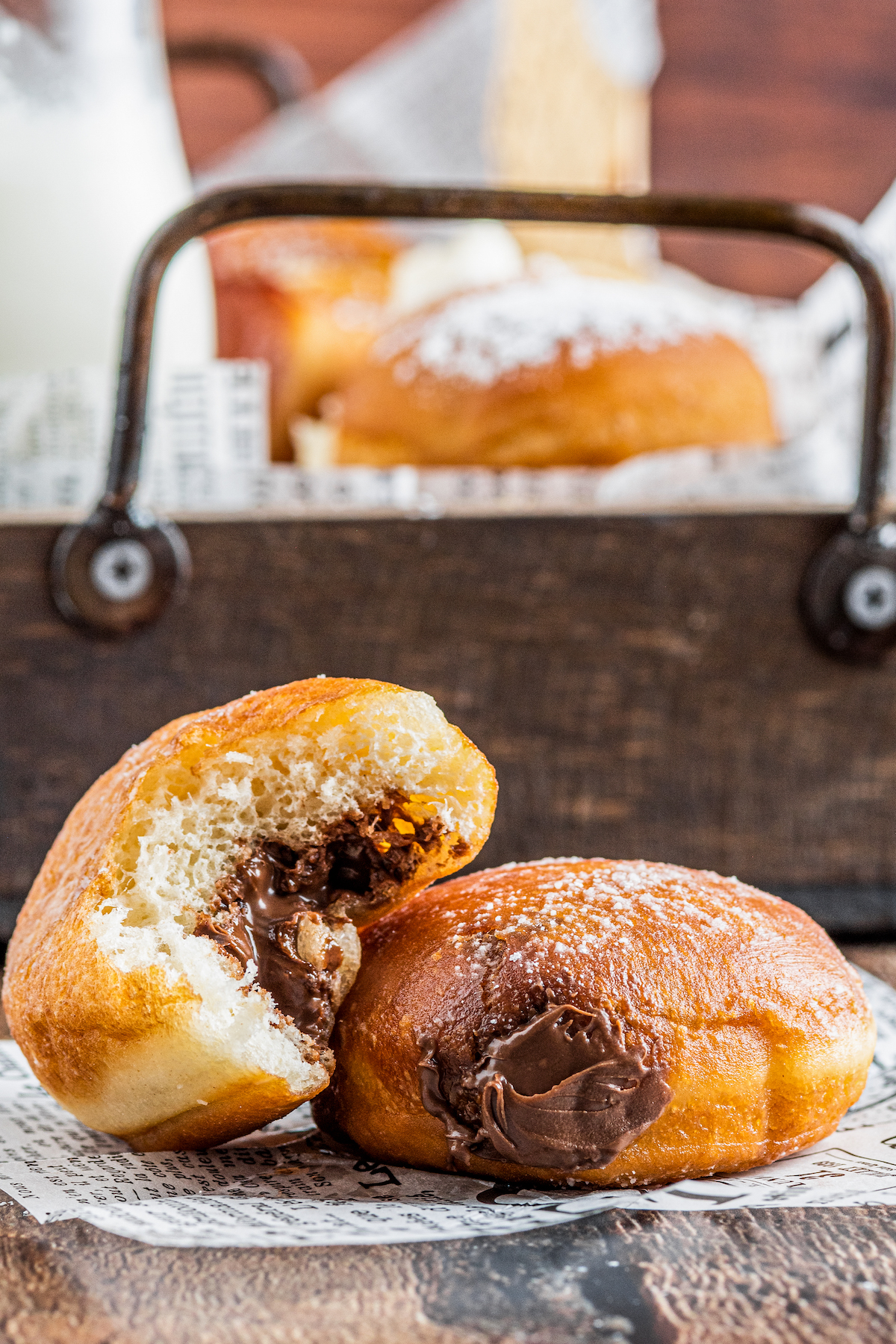 Close-up shot of two Nutella-filled donuts.
