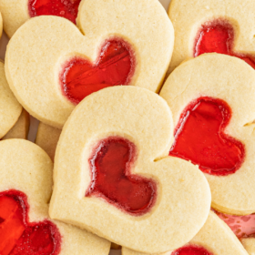 Valentine's Day heart cookies on a white plate.
