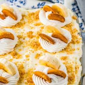 An overhead image of banana pudding in a casserole dish with Nilla wafers on top.