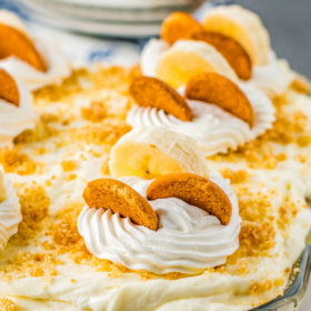 Banana pudding in a casserole dish with Nilla wafers on top.