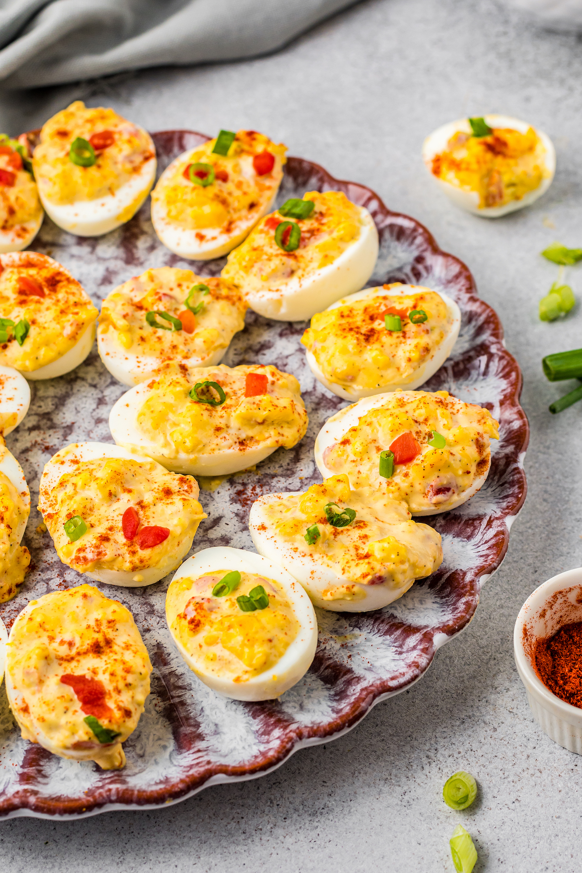 A serving platted filled with homemade deviled eggs