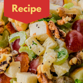 Waldorf Fruit Salad in a white bowl with Bibb lettuce.