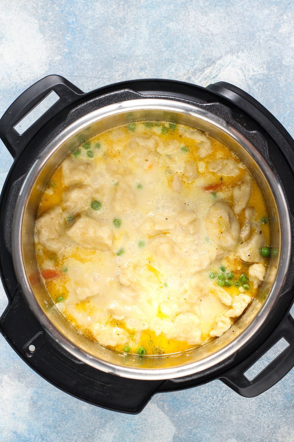 Chicken and dumplings with cream added.