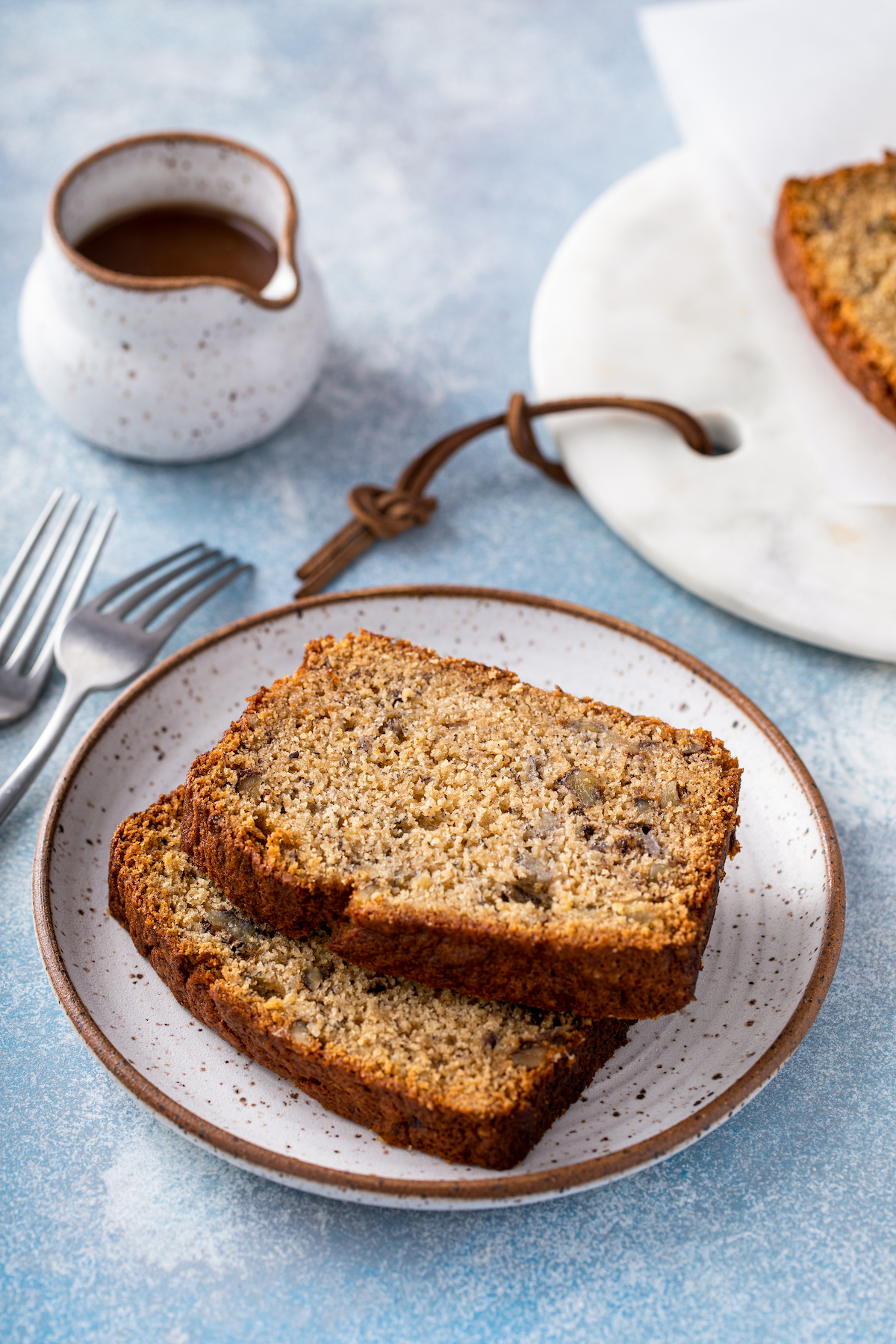 A serving of salted caramel banana bread on a plate.