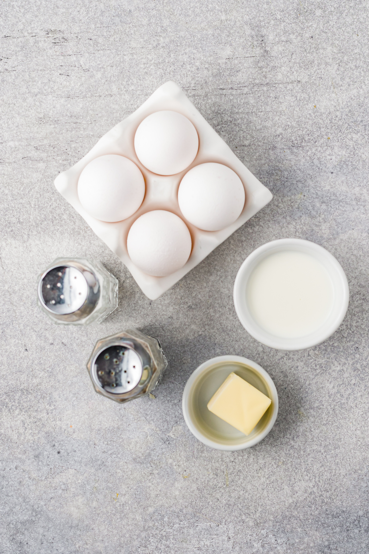 The ingredients for stove top scrambled eggs.