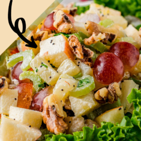 Waldorf salad in a white bowl with Bibb lettuce.