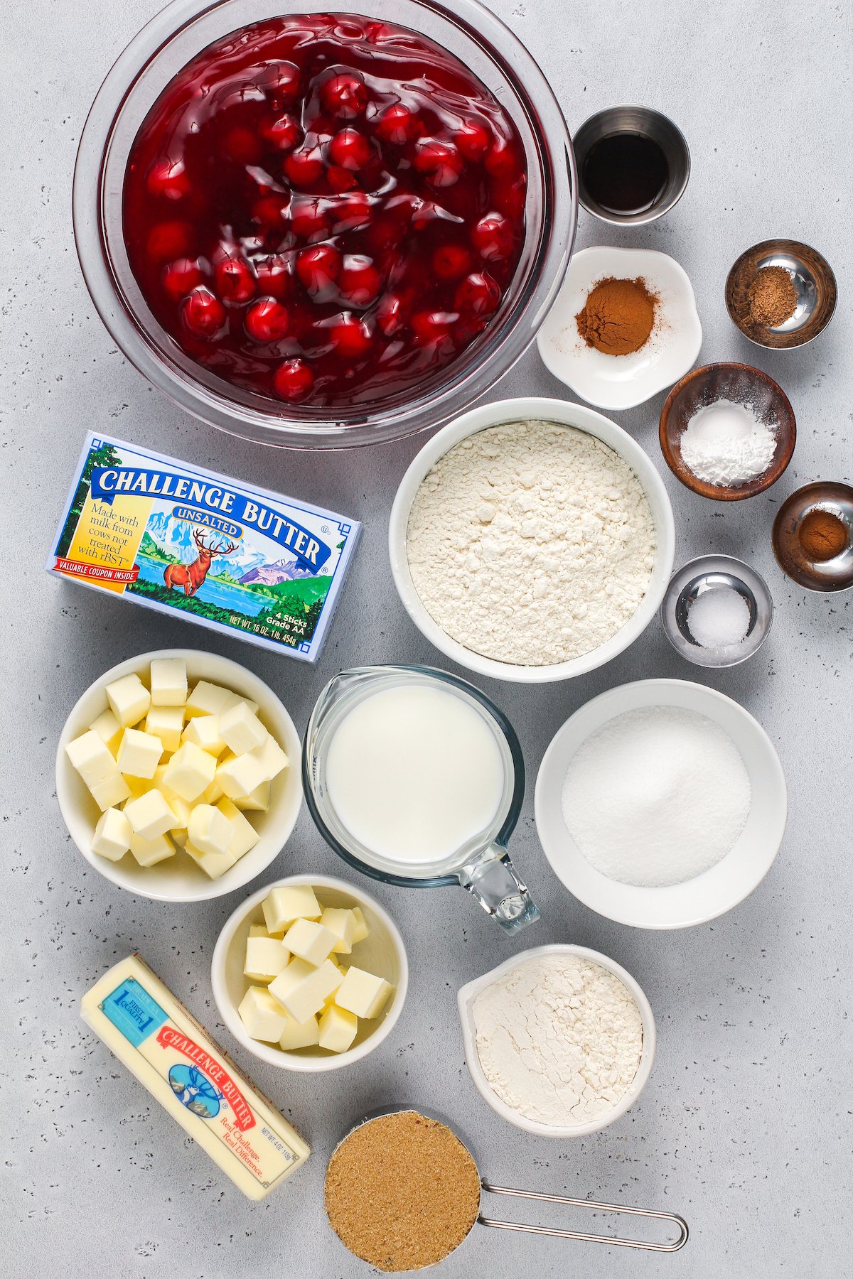 Ingredients for cherry cobbler in bowls.