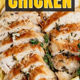 Sliced chicken with lemon and thyme over pasta.