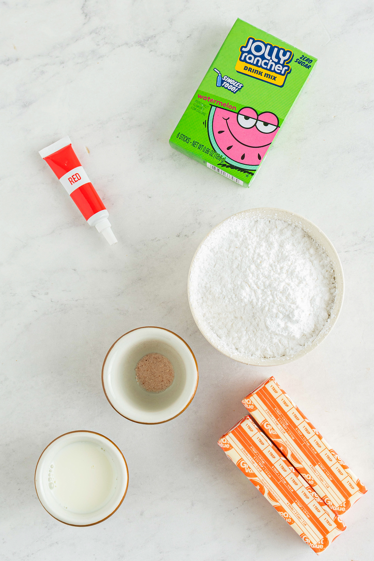 The ingredients for watermelon buttercream frosting.