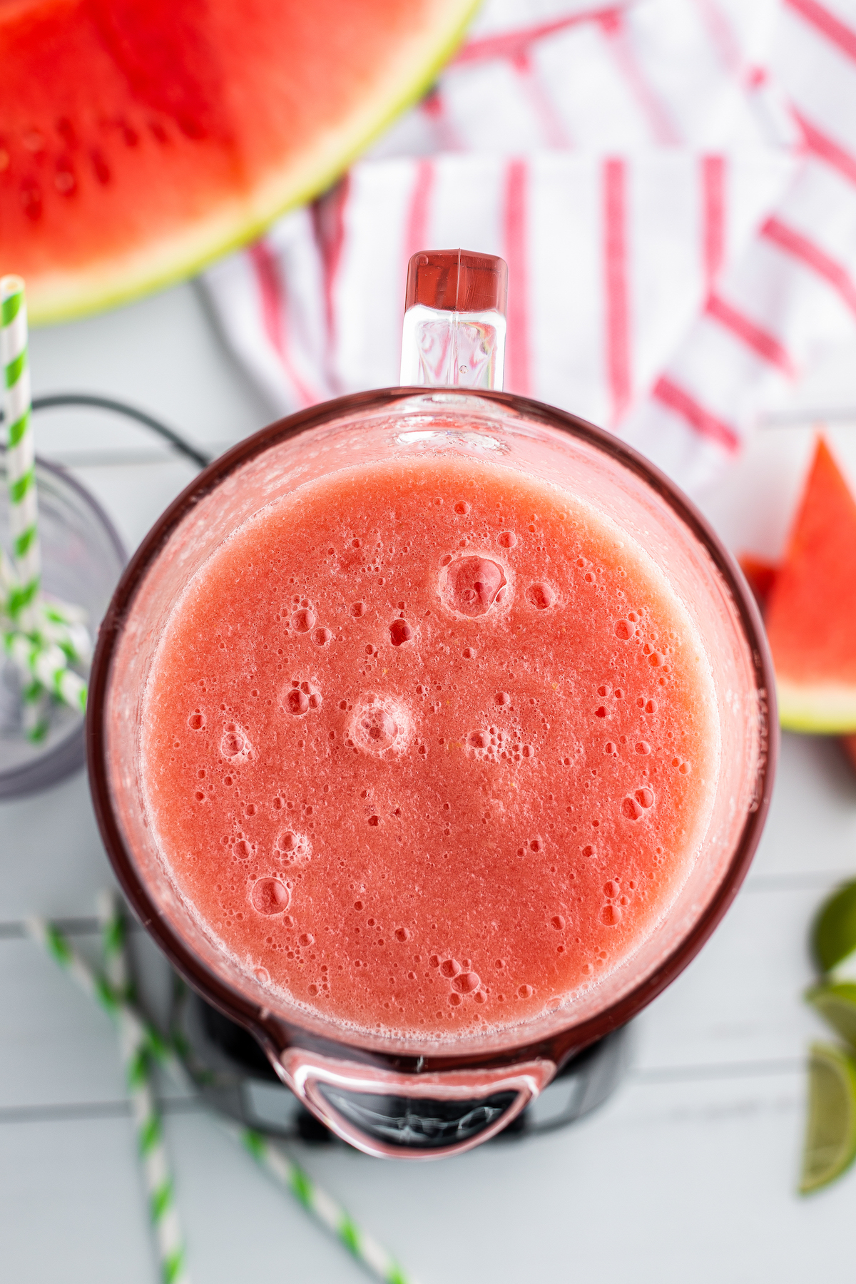 Blended watermelon limeade slushie in a blender.