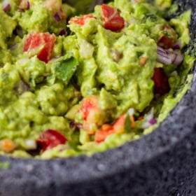 Guacamole in a Molcajete.