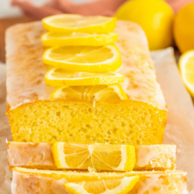 Slices of lemon bread on a cutting board.