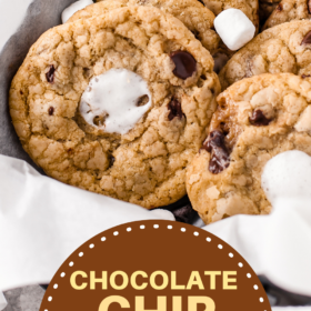 Chocolate Chip Marshmallow Cookies surrounded by parchment paper.