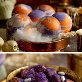 Orange and purple hot cocoa bombs on a platter and hot cocoa in a cup with marshmallows on top.