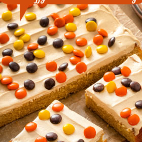 Overhead image of a peanut butter cake being sliced into pieces.