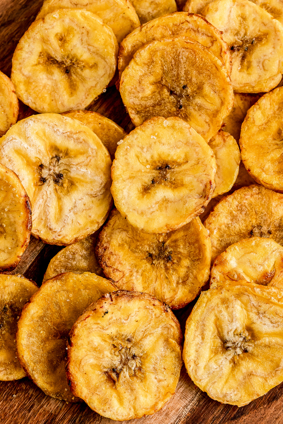 Close-up shot of plantain chips with sea salt.