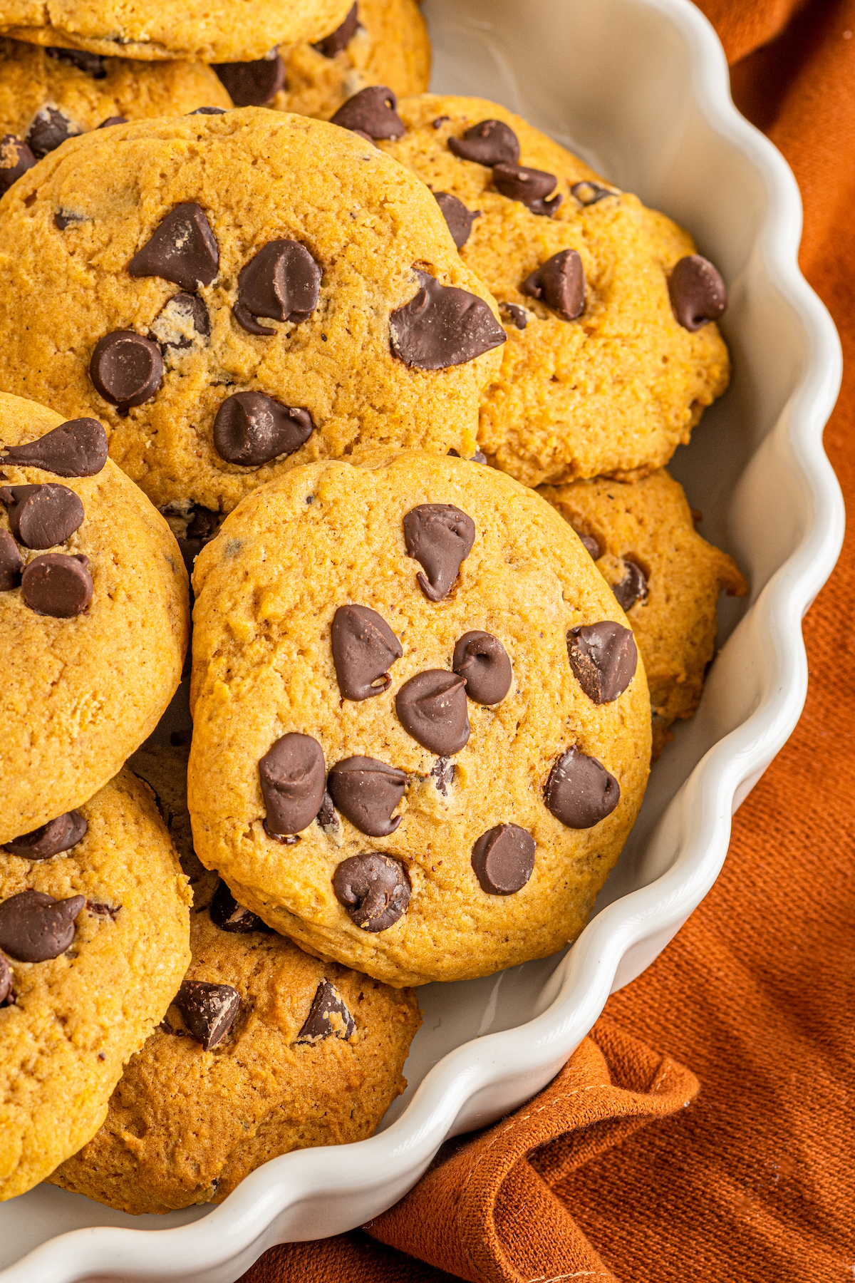 close up of a platter with pumpkin chocolate chip cookies